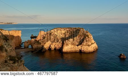 Beautiful View Of The Small Island Near The Beach Praia João De Arens In Algarve Region, Portugal