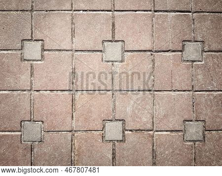 Close-up . Fragment Of Pavement Pavement With Decorative Tiles