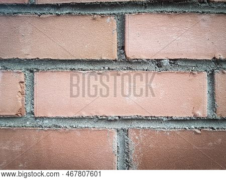 Fragment Of Red Brickwork. Background And Texture