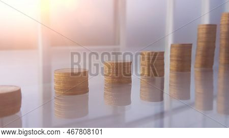 Towers Of Coins On A Glass Table, The Idea Of Business Banking