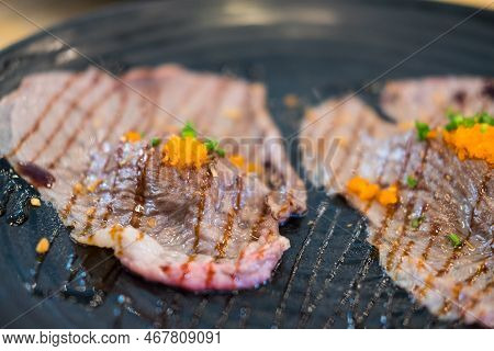 Grilled Sushi Wagyu Beef With Sweet Shoyu Sauce On Top With Ebiko Shrimp Eggs. Premium Grilled Beef 