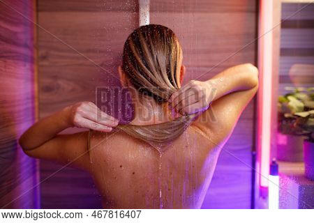 Beautiful Woman Washes Her Hair In The Shower