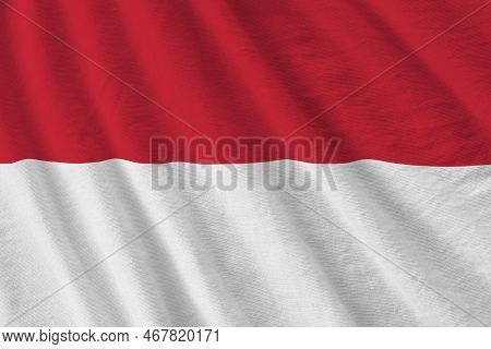 Indonesia Flag With Big Folds Waving Close Up Under The Studio Light Indoors. The Official Symbols A