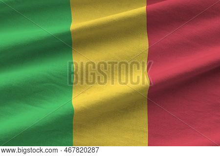 Mali Flag With Big Folds Waving Close Up Under The Studio Light Indoors. The Official Symbols And Co