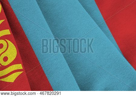 Mongolia Flag With Big Folds Waving Close Up Under The Studio Light Indoors. The Official Symbols An