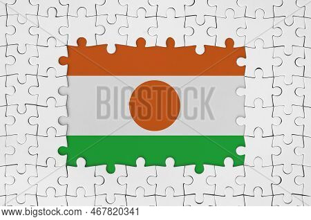 Niger Flag In Frame Of White Puzzle Pieces With Missing Central Parts