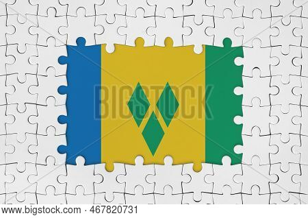 Saint Vincent And The Grenadines Flag In Frame Of White Puzzle Pieces With Missing Central Parts