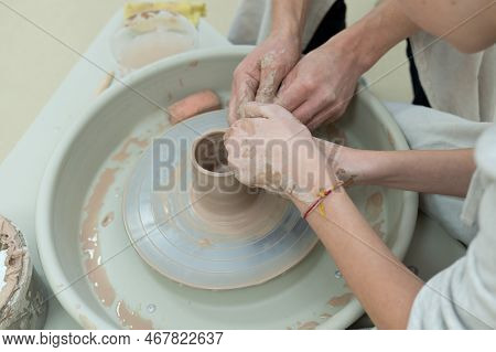 Close-up Of Hands Working With Clay. The Concept Of Hobbies And Hobbies, All-round Development Of Ch