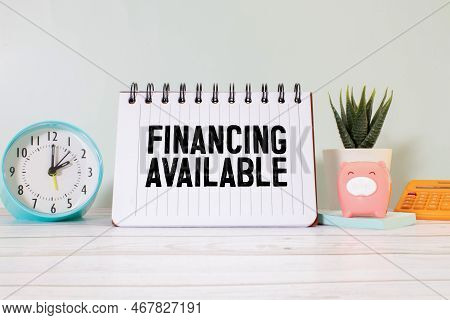White Card On The Black Background With Text Financing Available. Business Conzept.