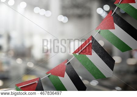A Garland Of Palestine National Flags On An Abstract Blurred Background