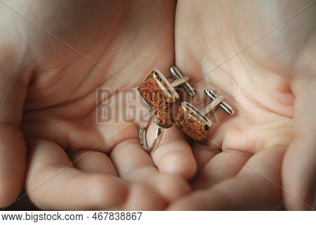 Close Up Handmade Studs With Natural Lichen Concept Photo. Side View Person Photography With Palms O