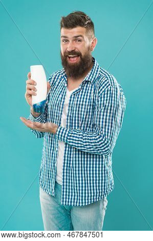 Body Care Cosmetic Bath Shower. Man Hold Shampoo Bottle. Hair Care. Shampoo For Daily Use. Skin Loti