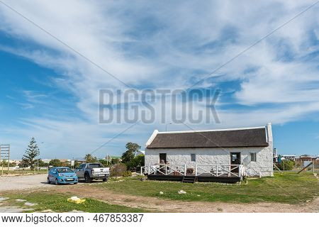 Struisbaai, South Africa - Sep 21, 2022: Street Scene, With The Small Town Meat Deli, In Struisbaai,