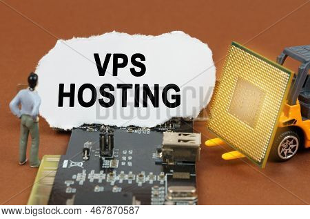Computer Concept. On The Board With Microcircuits Lies A Paper Plate With The Inscription - Vps Host
