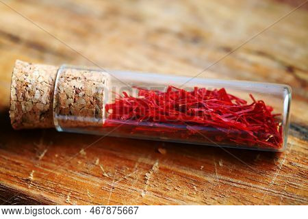 Selective Focus. Macro. Saffron. Dried Saffron Petals In A Glass Flask.