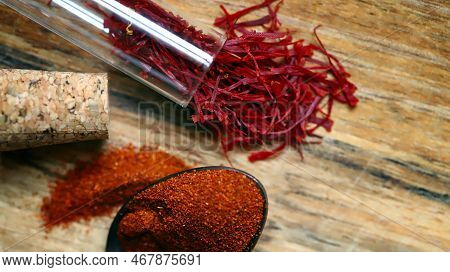 Selective Focus. Macro. Saffron. Dried Saffron Petals In A Glass Flask.