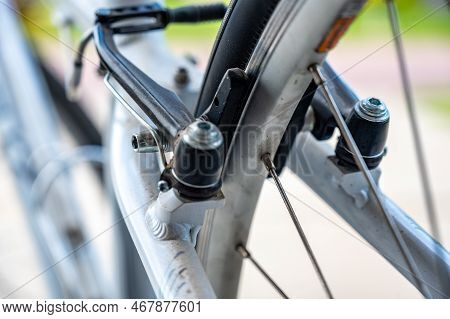 Selective Focus On Peddle Bike Brake Pads On Back Tire Rim
