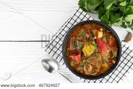 Khashlama - Meat Stew Of Beef Or Lamb Meat With Vegetables And On A Wooden Background. Armenian And 