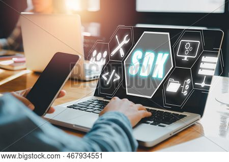 Sdk - Software Development Kit Programming Language Technology Concept, Person Typing Keyboard Compu