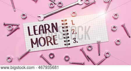 Hand Writing Sign Learn More. Business Idea Deepen Knowledge Of The Thing You Want To Do Or New Skil