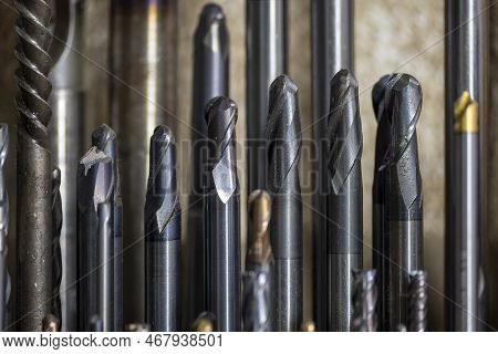 Close-up Scene The Group Of Used Cutting Tools For Cnc Milling Machine. The  Cutting  Tool For Machi