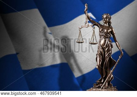 Honduras Flag With Statue Of Lady Justice And Judicial Scales In Dark Room. Concept Of Judgement And
