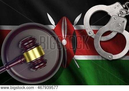 Kenya Flag With Judge Mallet And Handcuffs In Dark Room. Concept Of Criminal And Punishment, Backgro