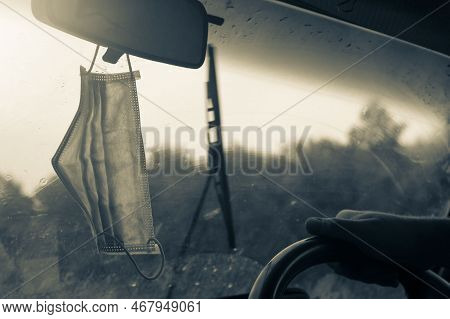 People Have Gotten Into The Habit Of Hanging Covid-19 Masks On The Rearview Mirror Of Their Vehicle'