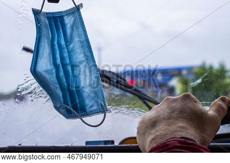 People Have Gotten Into The Habit Of Hanging Covid-19 Masks On The Rearview Mirror Of Their Vehicle'