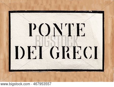 Signage Ponte Dei Greci - Bridge Of The Greek - In Venice At An Old Grunge House Wall