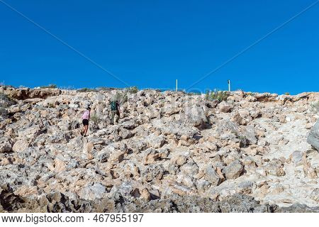 Arniston, South Africa - Sep 22, 2022: People Walking Back To The Parking Area From The Waenhuiskran