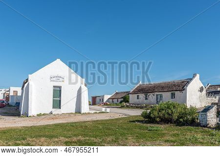 Arniston, South Africa - Sep 22, 2022: A Street Scene, With The Hall Of The Kassiesbaai Fishermans U