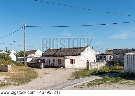 Arniston, South Africa - Sep 22, 2022: A Street Scene, With Historic Houses, In Kassiesbaai, An Hist