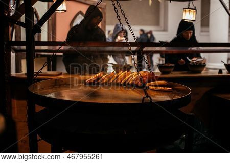Dresden, Saxony, Germany, 10 December 2022: Christmas Medieval Outdoor Market Stall Decorations With