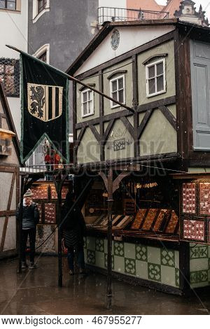 Dresden, Saxony, Germany, 10 December 2022: Christmas Medieval Outdoor Market Stall Decorations With