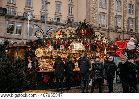 Dresden, Saxony, Germany, 10 December 2022: Christmas Outdoor Market Stall Decorations With Fairy C 