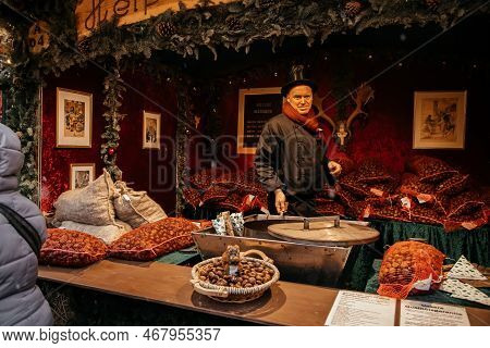 Dresden, Saxony, Germany, 10 December 2022: Christmas Outdoor Market Stall Decorations With Fairy Wi