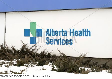 Calgary, Alberta, Canada. Dec 27, 2022. An Alberta Health Services Sign During The Winter Outside Of
