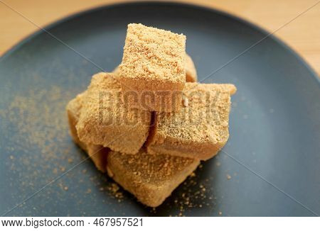 Closeup Of Warabimochi, A Tasty Japanese Traditional Confection Covered With Kinako Flour