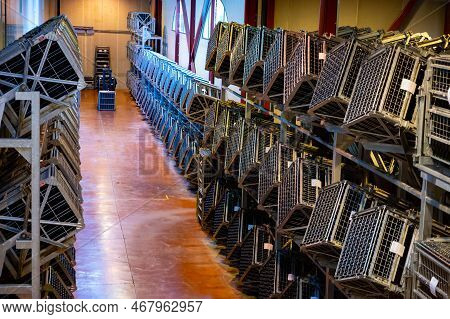 Production Of Cremant Sparkling Wine In Burgundy, France. Automatically Powered Riddling Remuage Box