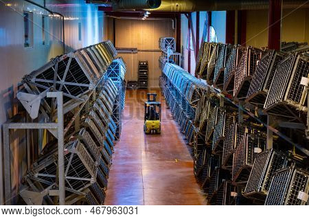 Production Of Cremant Sparkling Wine In Burgundy, France. Automatically Powered Riddling Remuage Box