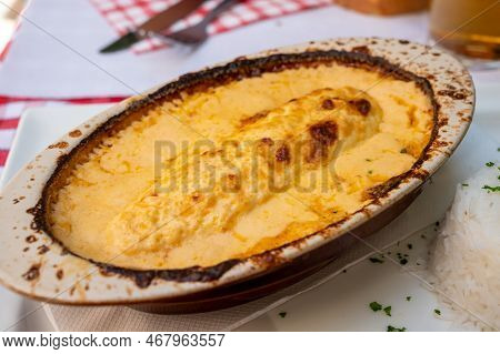Quenelle, Speciality Of Lyon, Oval-shaped Dumplings Filled With Pike White Fish Served In Creamy Sau