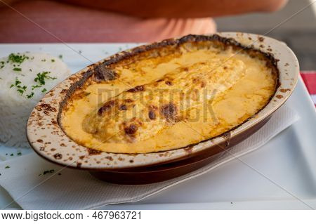 Quenelle, Speciality Of Lyon, Oval-shaped Dumplings Filled With Pike White Fish Served In Creamy Sau