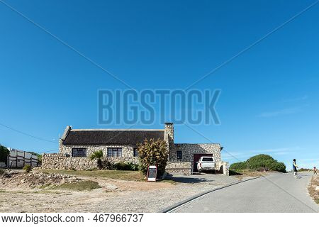Arniston, South Africa - Sep 22, 2022: A Street Scene, With Miens Tea Garden, In Kassiesbaai, Arnist