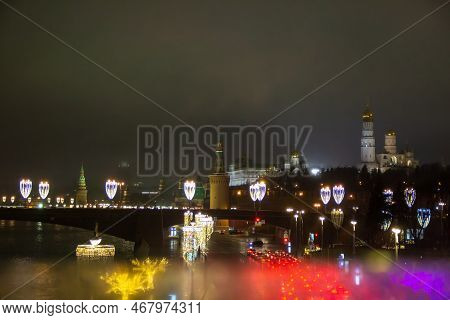 A View Of Moscow At Night From Across River, Kremlin At Fog On Background. Kremlin Towers, Kremlevsk
