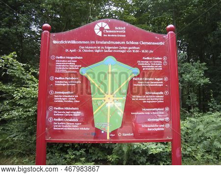 Clemenswerth, Germany - July 3, 2008: Information Sign With Guideline Where To Go At Castle Clemensw