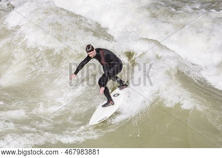 Munich, Germany - April 7, 2009: People Surfing On The Isar For Season Opening Contest In Munich. Su