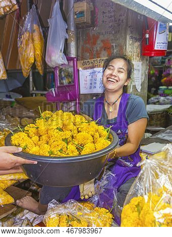 Bangkok, Thailand - May 12, 2009: Woman Sells Fresh Flowers At The Morning Market Pak Khlong Thalat 