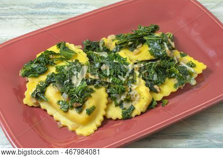 Butternut Squash And Cheese Agnolotti Pasta With Kale Shallot And Nuts