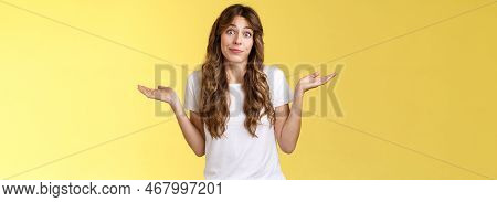 Sorry Unable Help. Clueless Apathetic Attractive Female Friend Shrugging Hands Spread Sideways Full 
